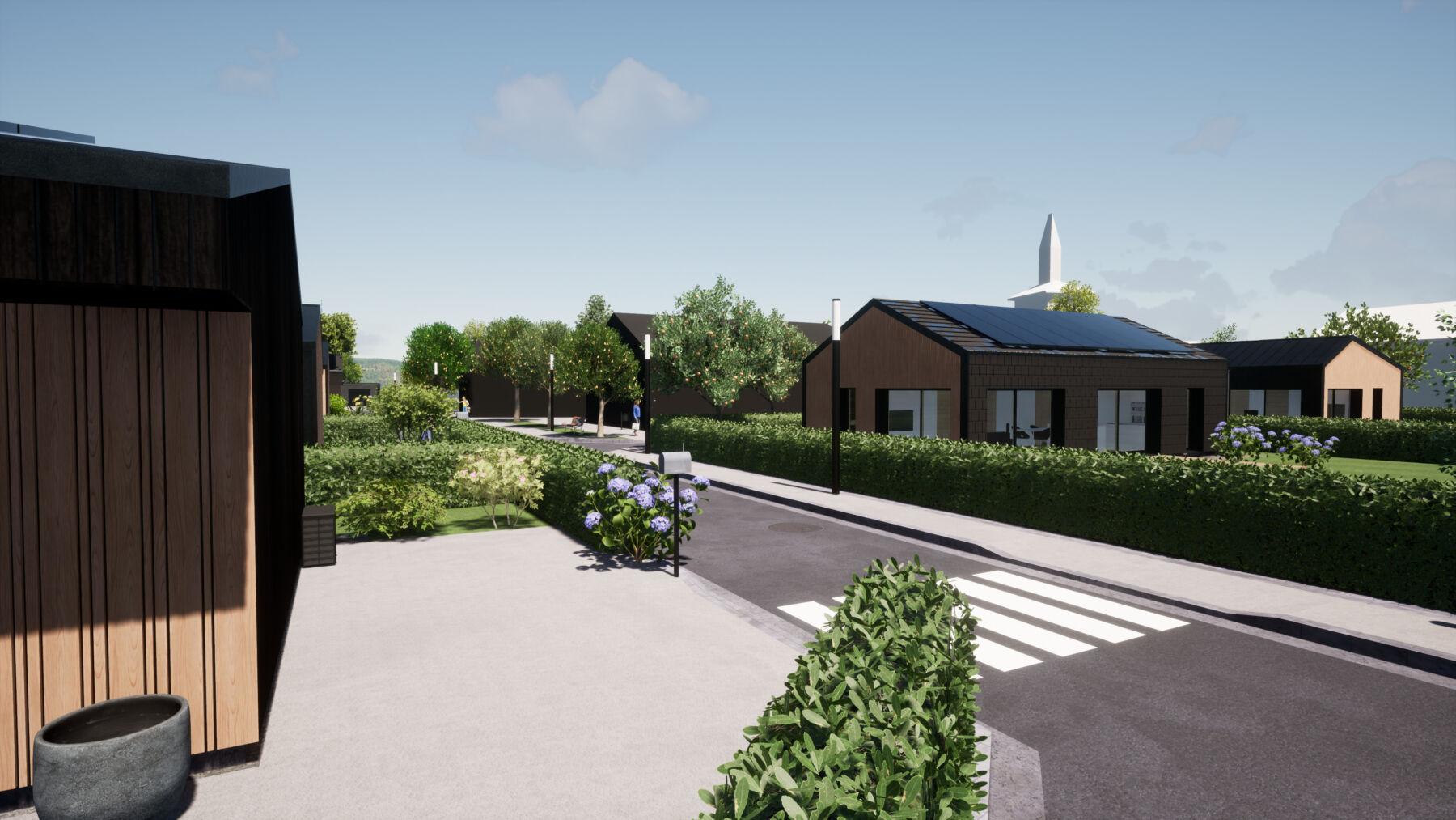 Vue sur une des maisons passives avec des panneaux photovoltaïques - Passiv'Home